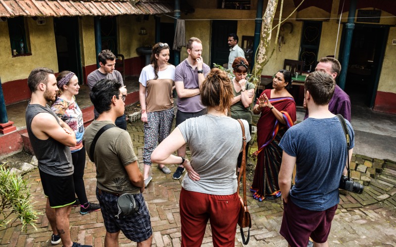 Sanghita the secretary of FOKE talks with the group about the work of FOKE in the projects it operates.