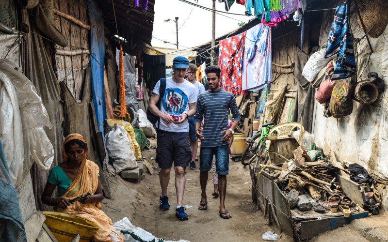 Imran from Topsia shows the group around the slum area beside our centre where many of our students families live.